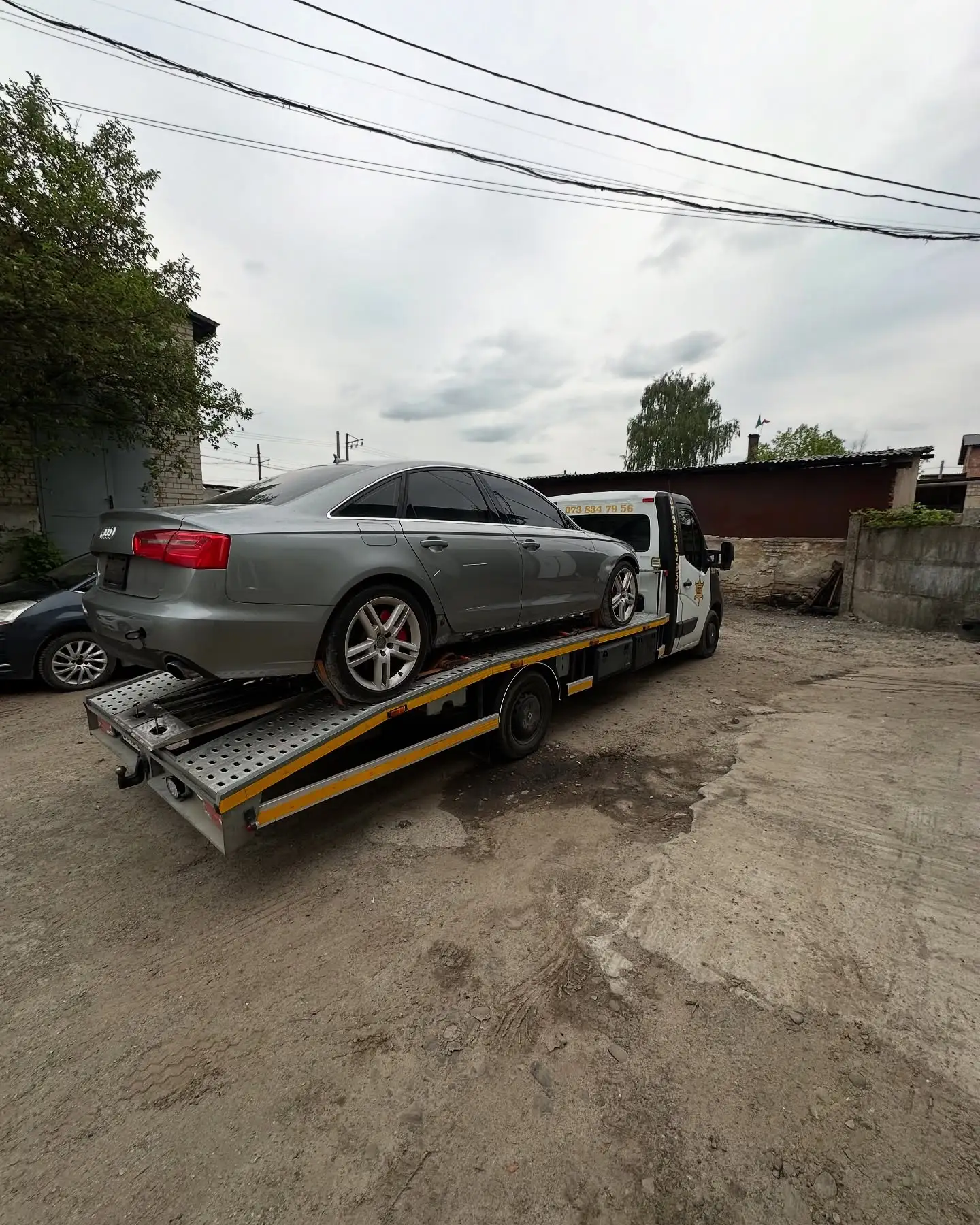 Завантаження легкового авто на евакуатор SHERIFF