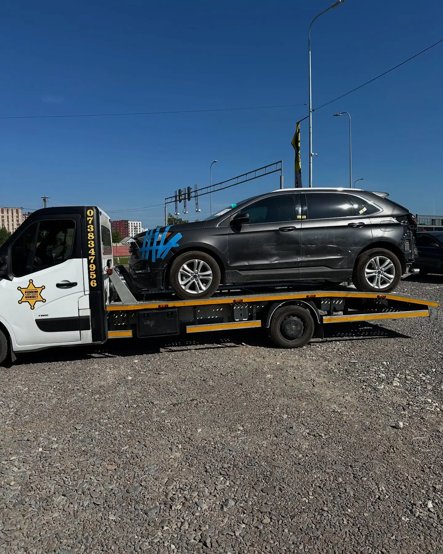 Евакуатор SHERIFF з авто на платформі у Львові